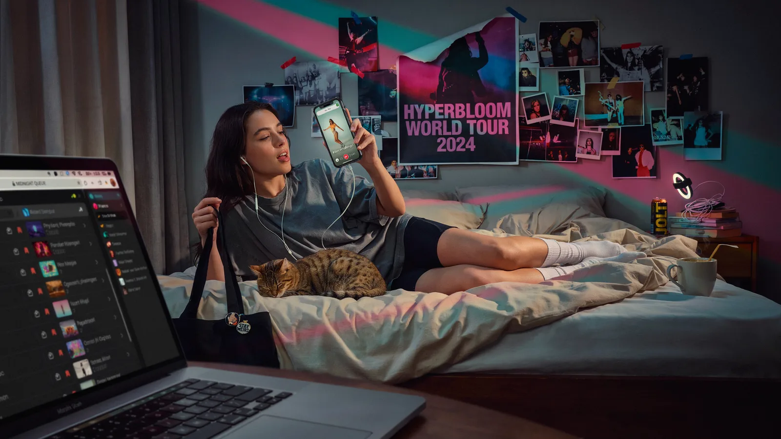 A smartphone showing a viral dance video beside headphones and a laptop, titled Best Songs That Became Viral Internet Hits.